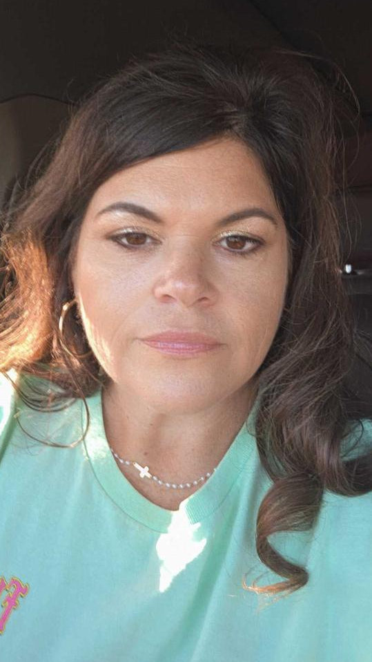 Customer wearing the Cross & Pearls Necklace