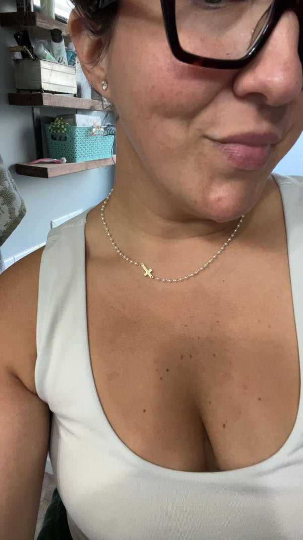 Customer wearing the Cross & Pearls Necklace