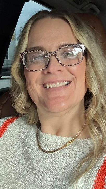 Customer wearing the Cross & Pearls Necklace