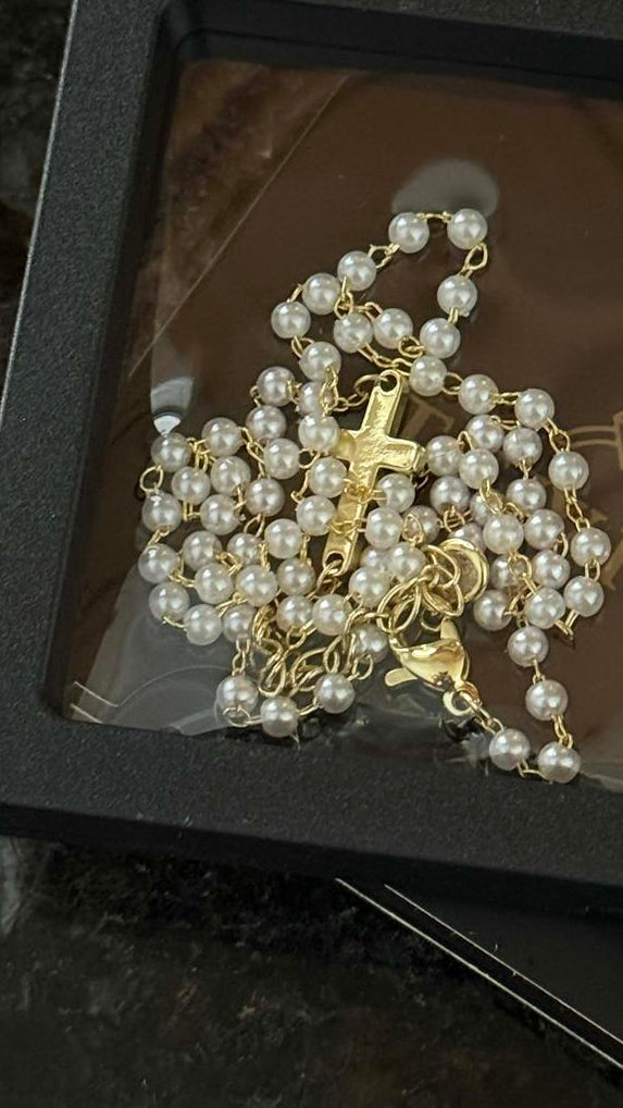 Customer wearing the Cross & Pearls Necklace