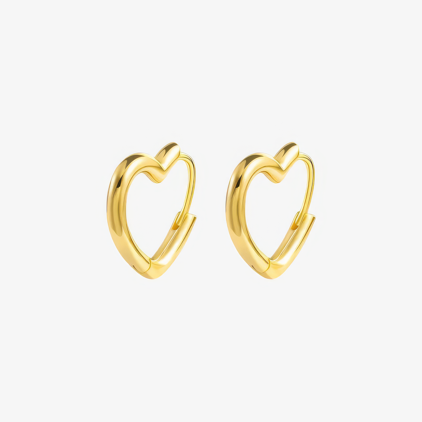 Heart Earrings – heart-shaped hoop earrings in 18k gold and silver by Lainly™